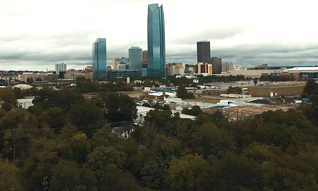 Downtown Oklahoma City skyline rising above an inner city community 