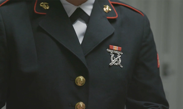 Close up of medals on Marine Corps dress blues of PFC Brianna Bighorse