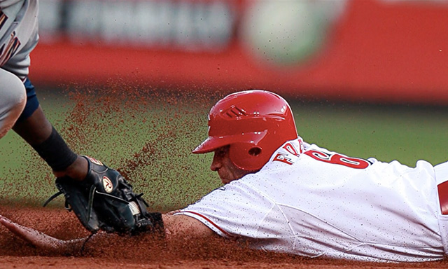 Ryan Freel sliding under a tag at second base.
