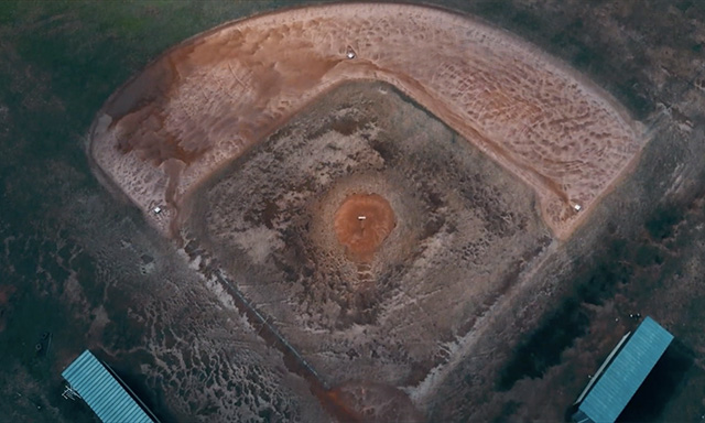 Aerial photo of the neglected baseball field at Southeast High School in Oklahoma City before it was renovated by Fields & Futures and Cal Ripken, Sr. Foundation.
